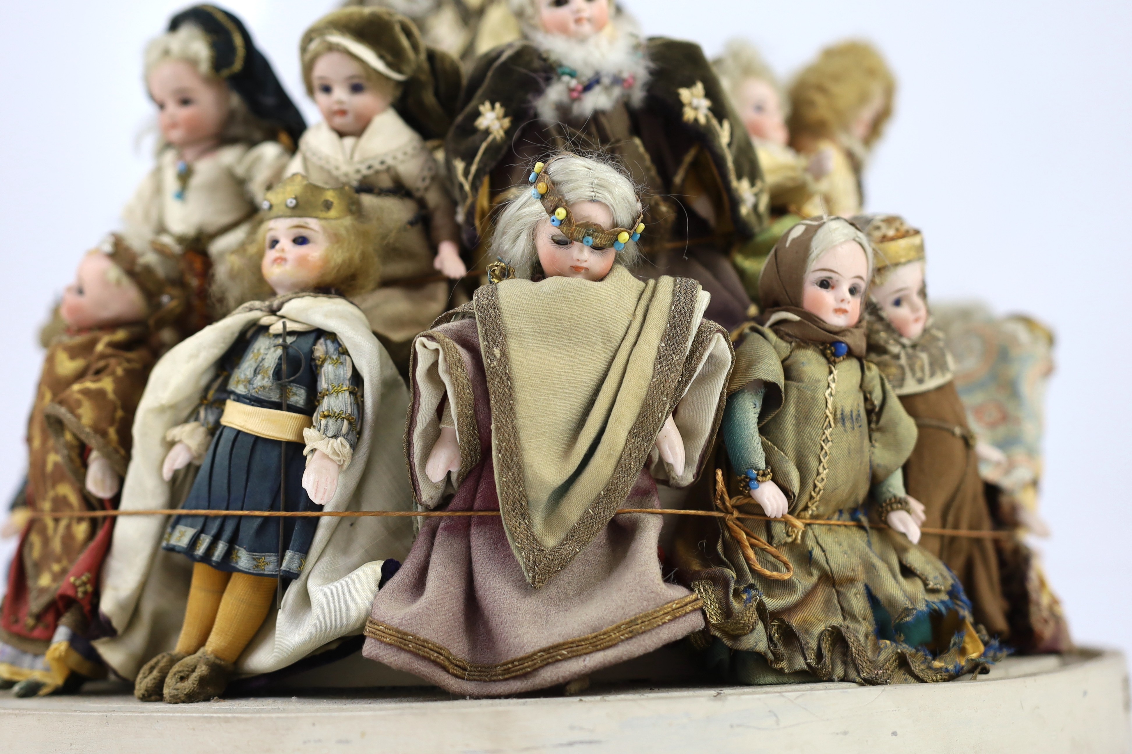 A rare collection of twenty-three German all-bisque dolls, circa 1910